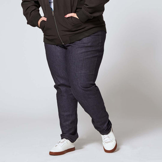 Plus size denim jeans paired with reversible bomber