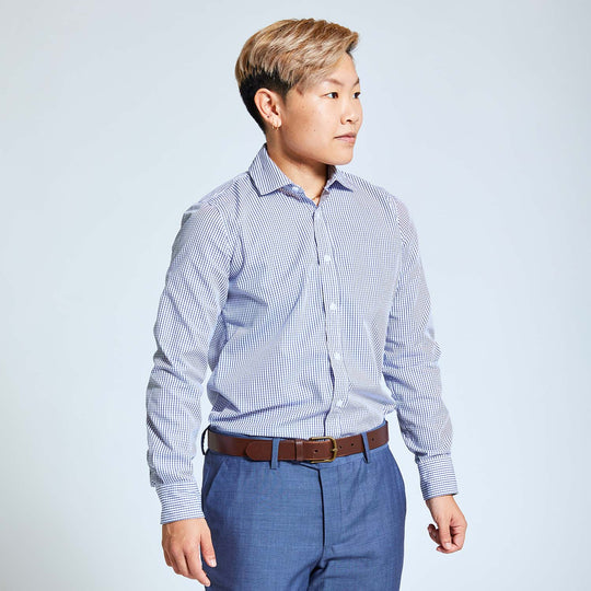 Androgynous person modeling Kirrin Finch Navy grid shirt