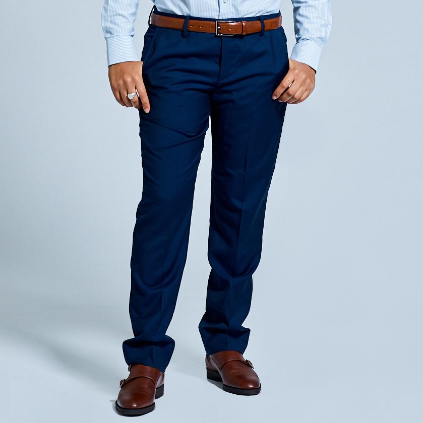 Model wearing Georgie Navy Blue Dress Pants for women. Color: Navy