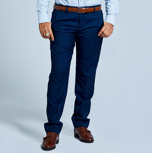 Model wearing Georgie Navy Blue Dress Pants for women. Color: Navy