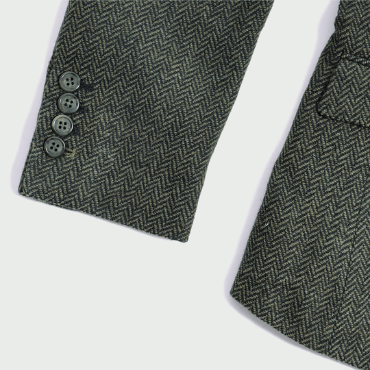 Sleeve button details of olive tweed herringbone blazer by Kirrin Finch