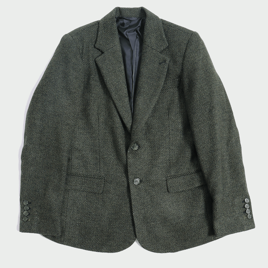 Olive Herringbone Tweed Blazer with Green buttons by Kirrin Finch on neutral background
