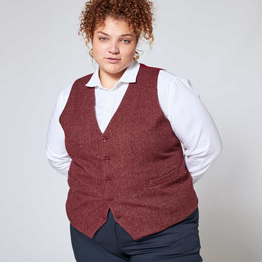 Person modeling tweed burgundy vest over a classic white dress shirt by Kirrin Finch