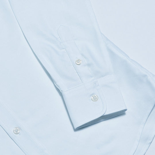 Cuff details on women's dress shirt translucent pearlescent buttons