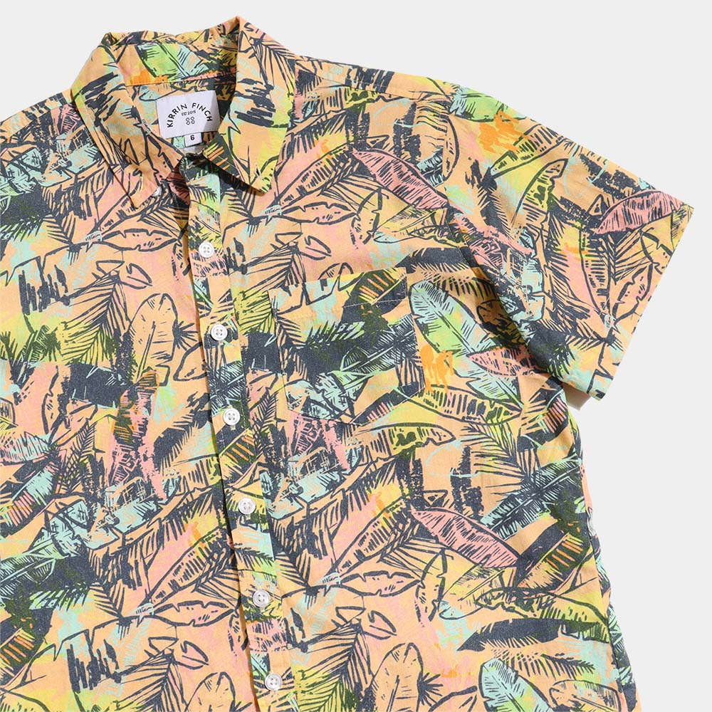 Multi-Leaf patterned shirt in a mix of yellow, orange, and a touch of blue on neutral background