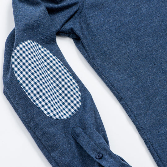 Blue and white gingham elbow patch detail on blue flannel shirt